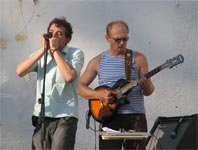 Фотография выступления группы ЧеРДаК на open air перед ДК «Металлургов» - Роман Беляков и Сергей Захаров * 4 июня 2010 года